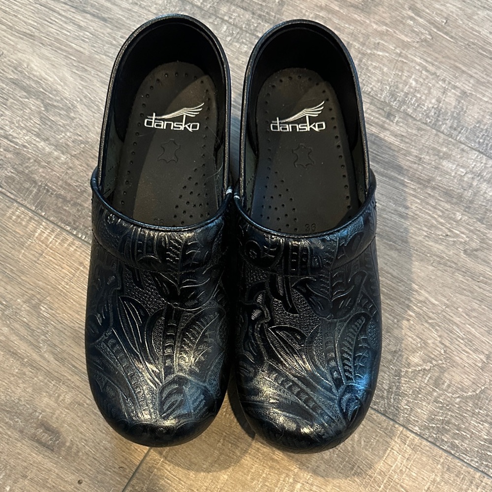 Dansko Embossed Black Leather Clogs
